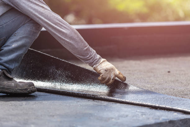 Professional Basement Waterproofing technician working in Kingsville, MD